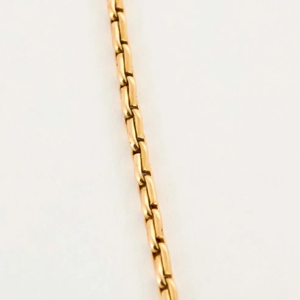 Chaîne en or jaune et pendentif porte souvenir ouvrant or , diamants et saphir