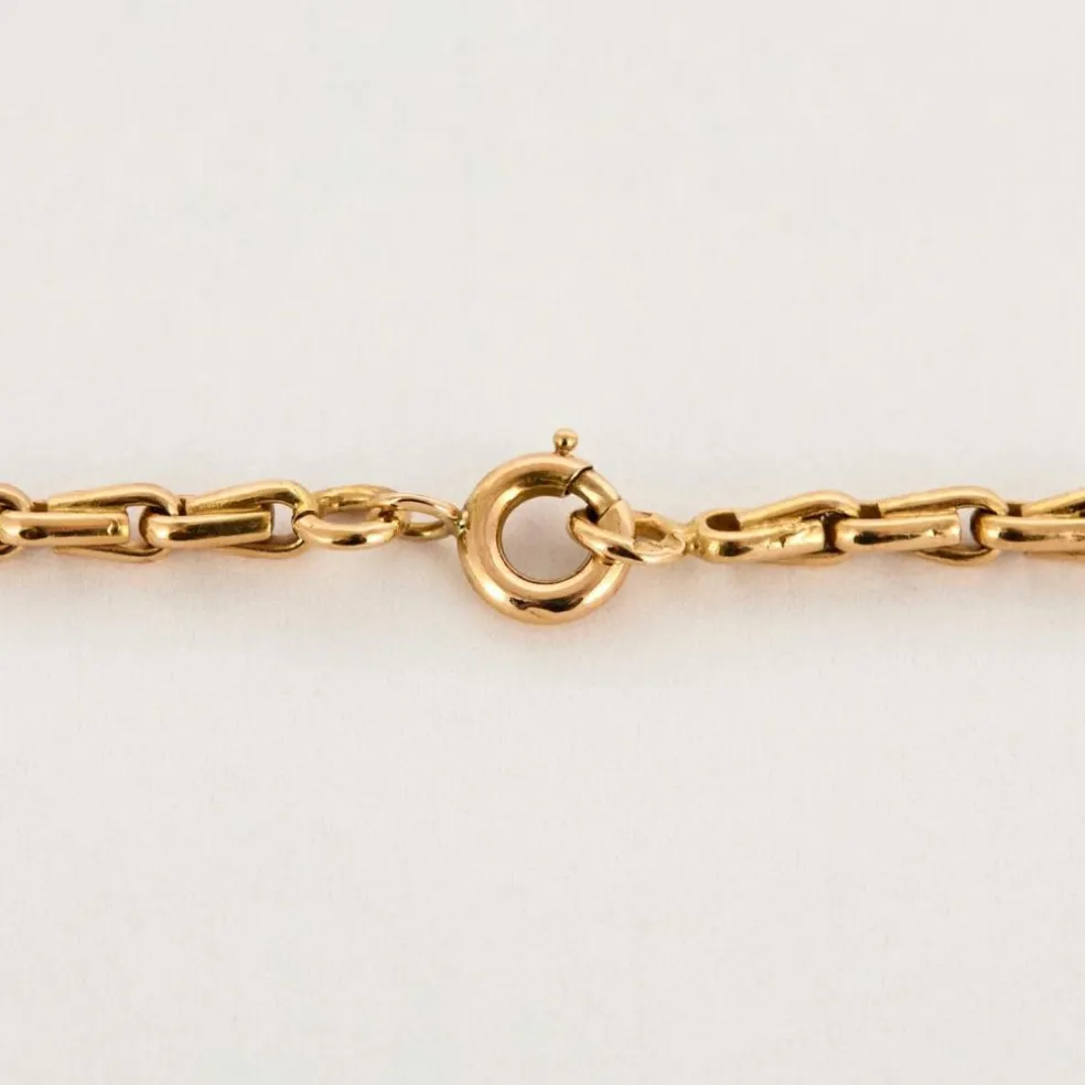 Chaîne en or jaune et pendentif porte souvenir ouvrant or , diamants et saphir