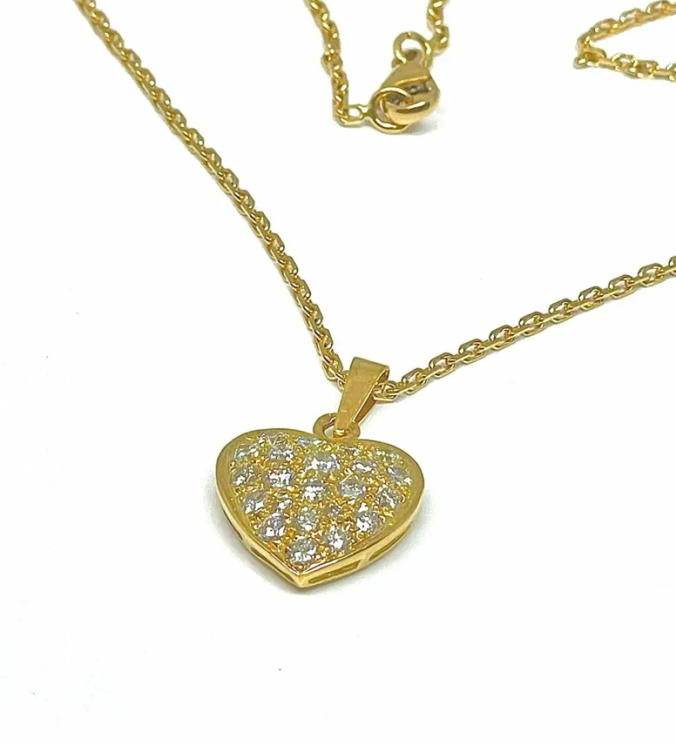 Chaîne et pendentif cœur en or jaune et diamants