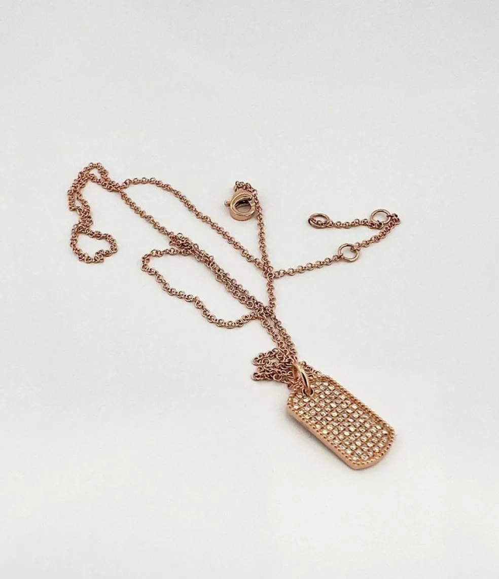 Chaîne et pendentif plaque GI or rose et diamants