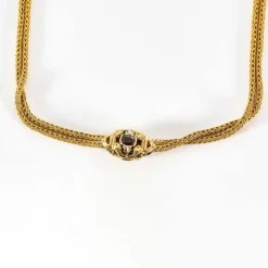 Chaîne giletière or jaune et grenat