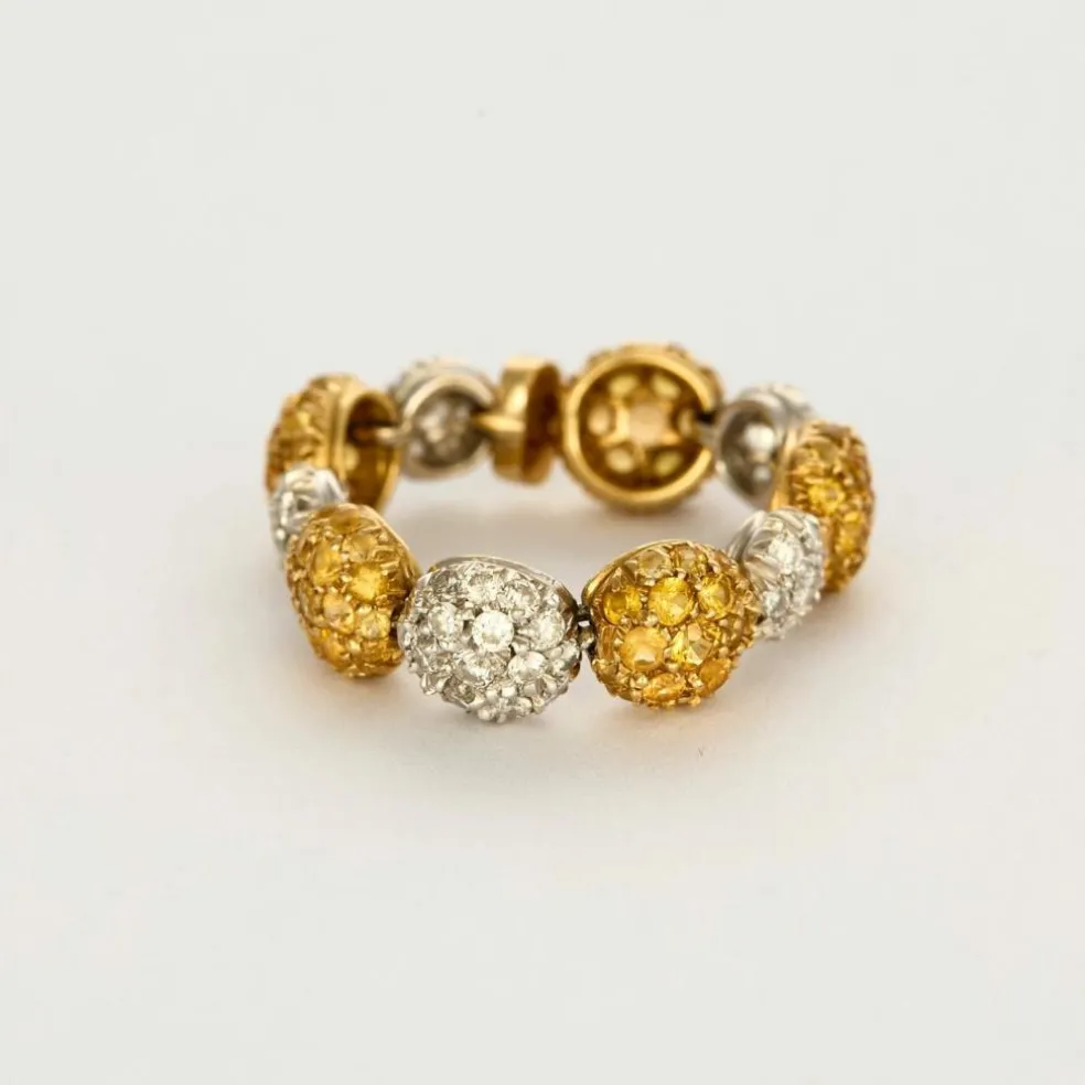 CHANTECLER - Bagues souples en or jaune et or gris, diamants et saphirs jaune