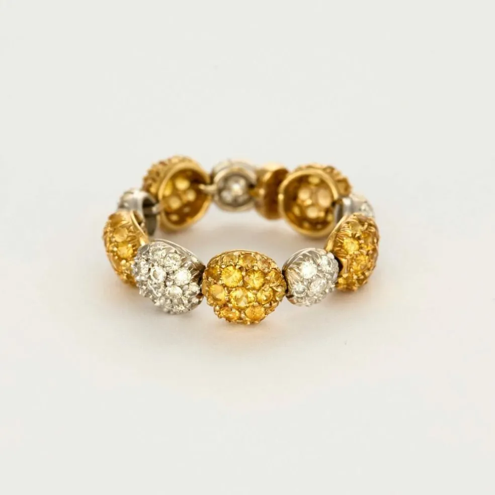 CHANTECLER - Bagues souples en or jaune et or gris, diamants et saphirs jaune