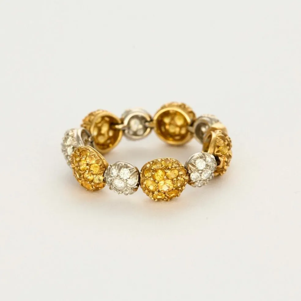 CHANTECLER - Bagues souples en or jaune et or gris, diamants et saphirs jaune