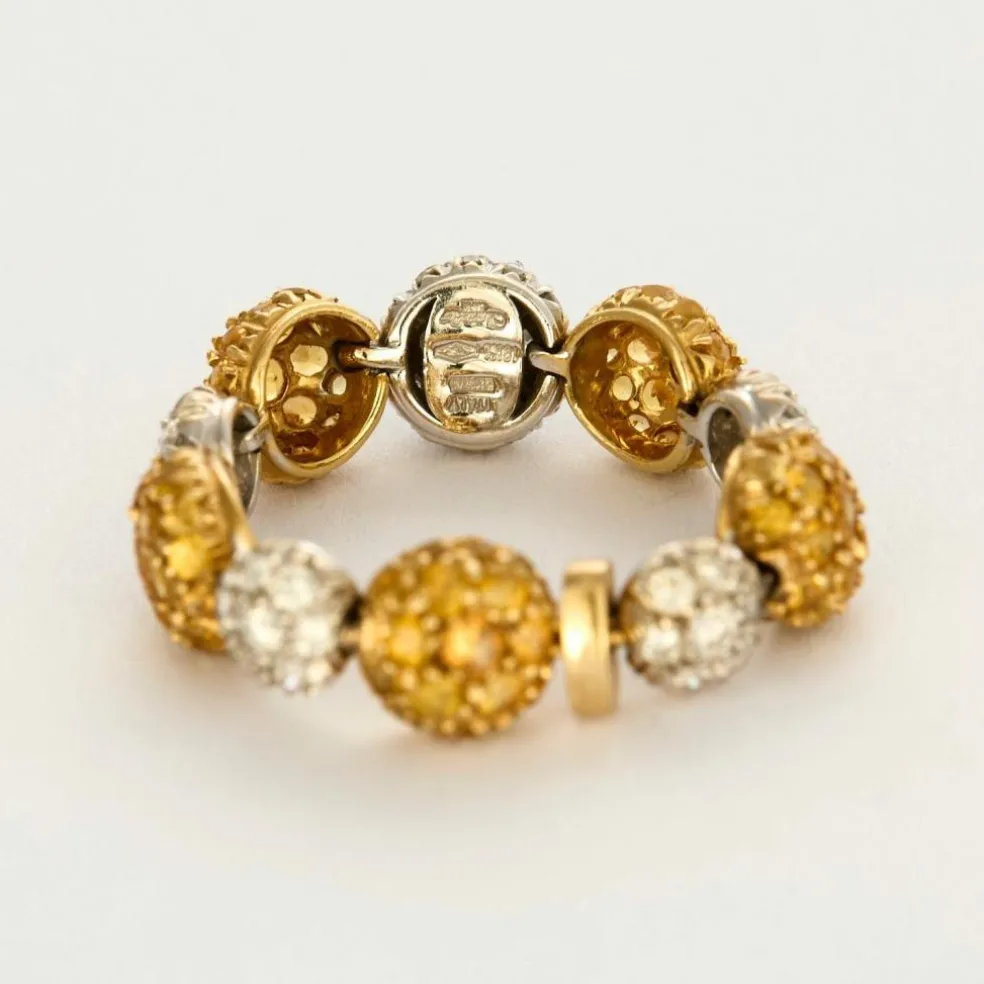 CHANTECLER - Bagues souples en or jaune et or gris, diamants et saphirs jaune