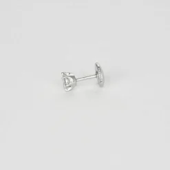 Clous d'oreilles or blance et diamants