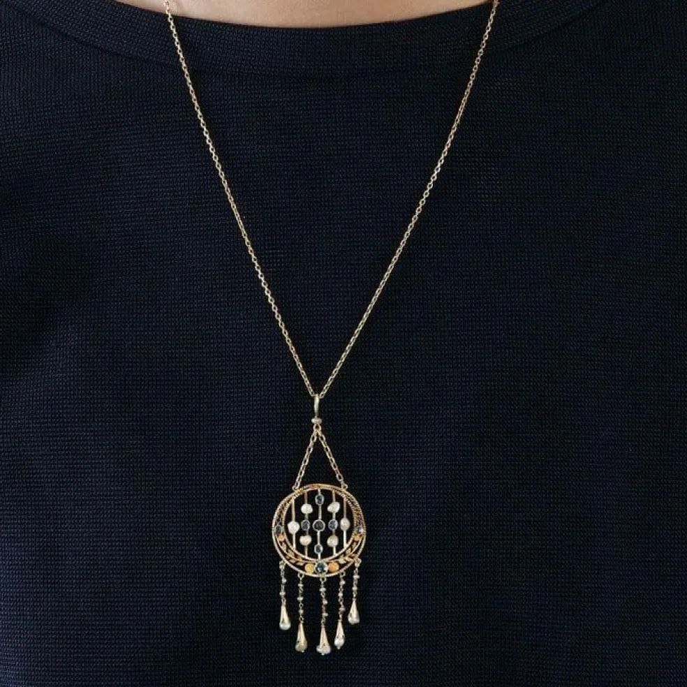 Collier ancien en or jaune, saphir et perles fines baroques
