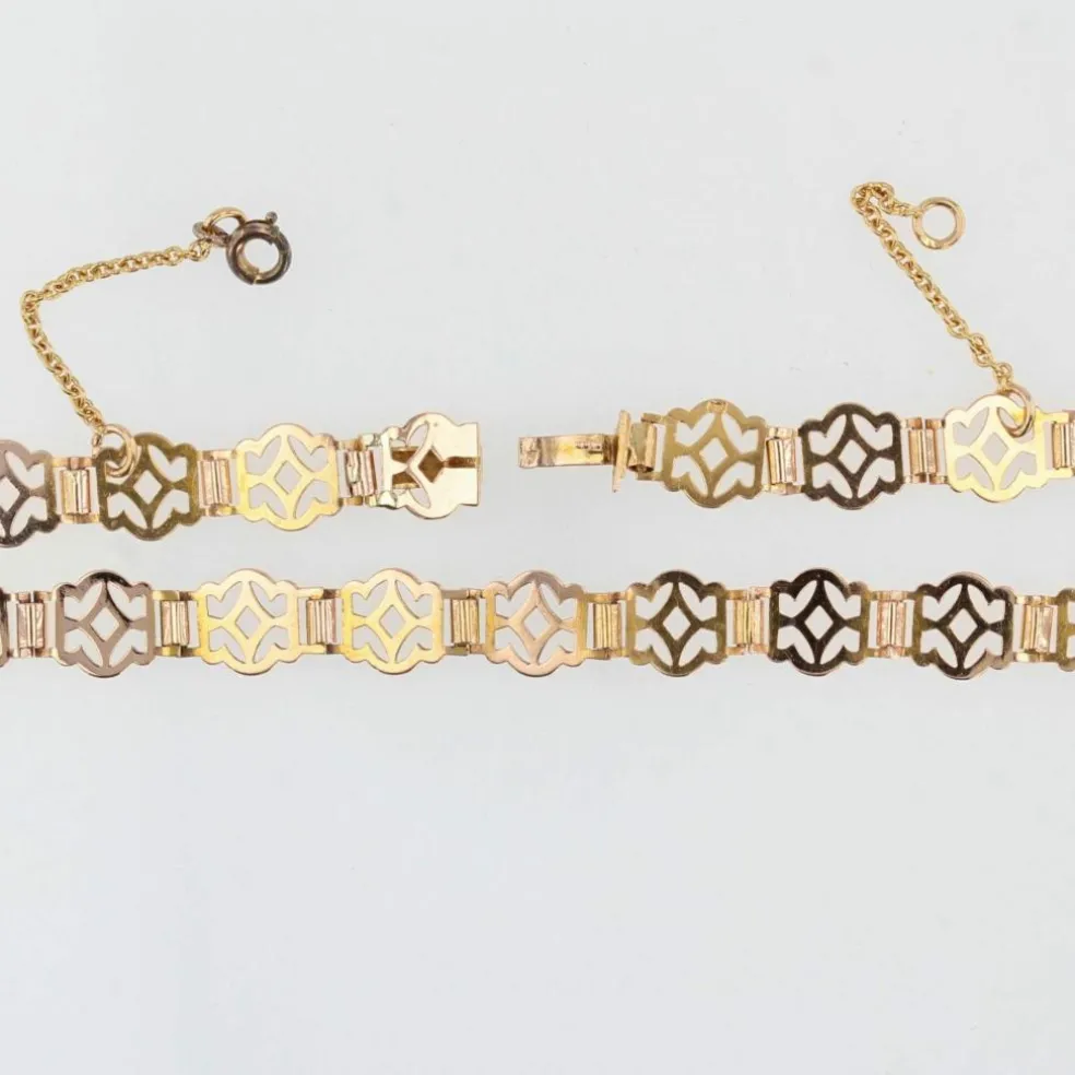 Collier ancien en or rose à motifs ajourés et articulés