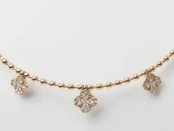 Collier boules rigide et trèfles en or rose et diamants