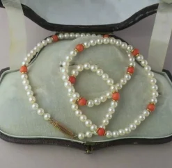 Collier choker or rose perles de culture Akoya corail
