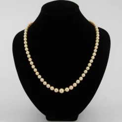 Collier chute de perles de culture dorées