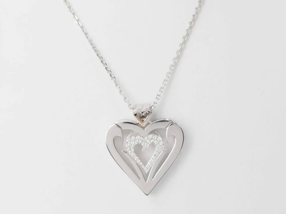 Collier coeur en or blanc et diamants