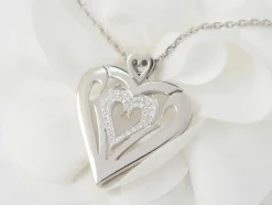 Collier coeur en or blanc et diamants