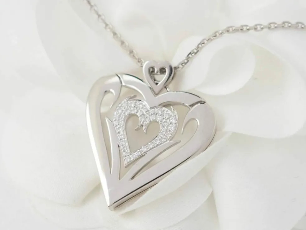 Collier coeur en or blanc et diamants