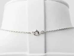 Collier coeur en or blanc et diamants