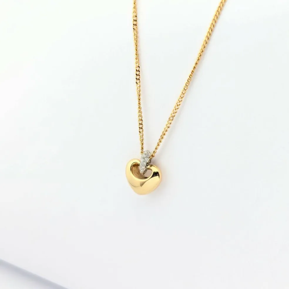 Collier coeur en or jaune et diamants