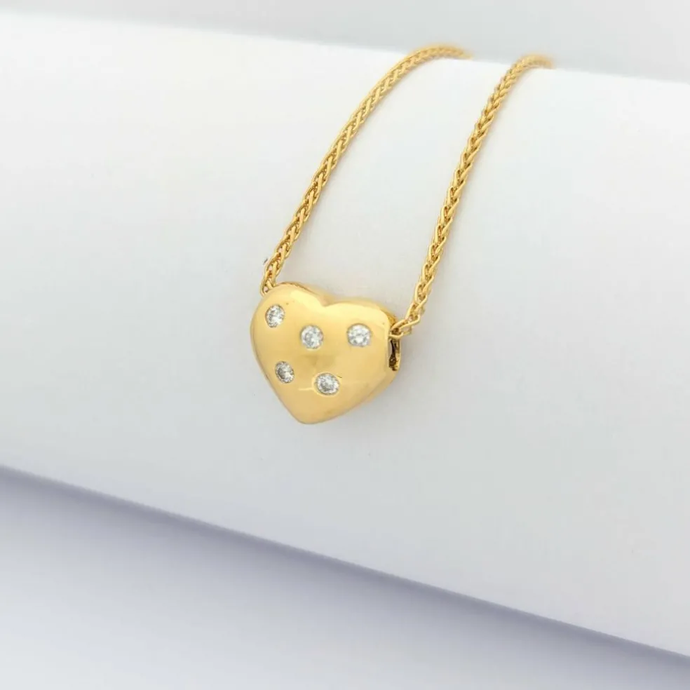 Collier cœur en or jaune et diamants