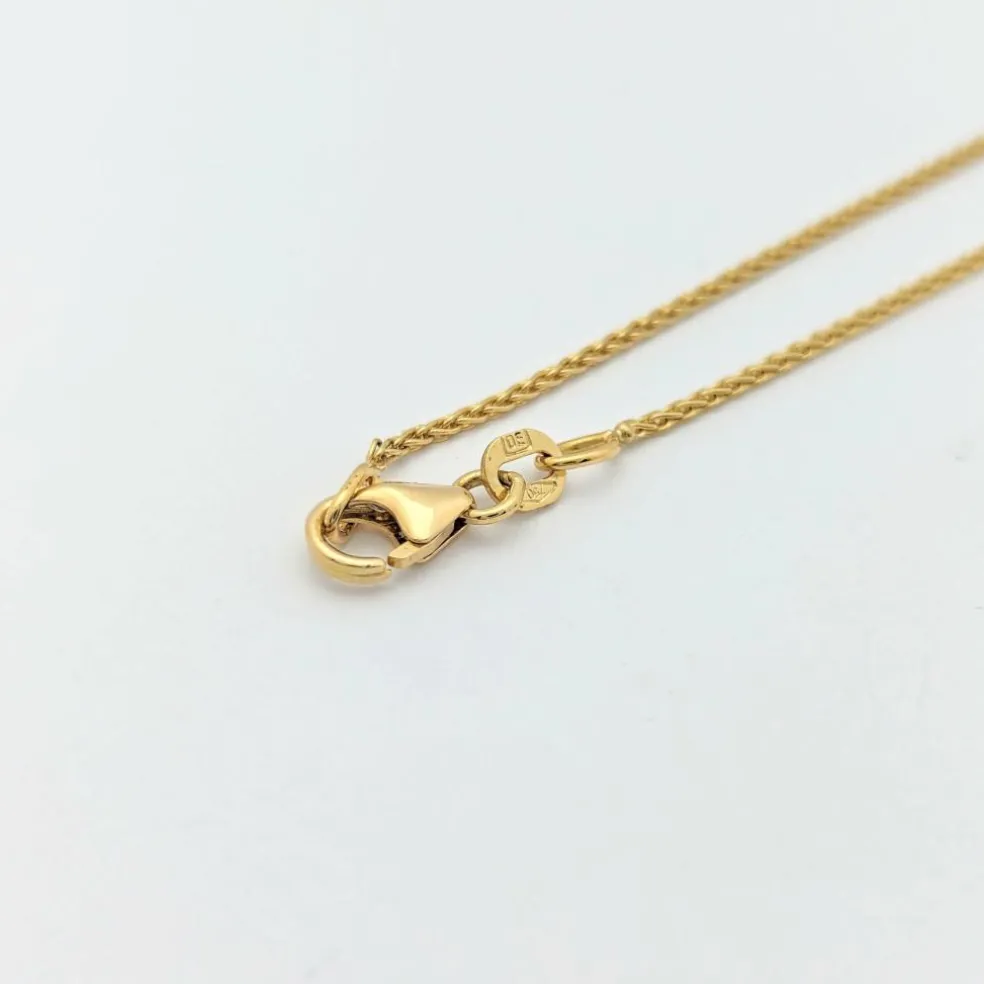 Collier cœur en or jaune et diamants