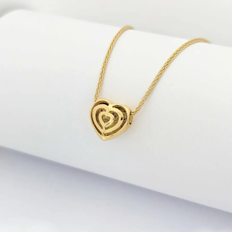 Collier cœur en or jaune et diamants