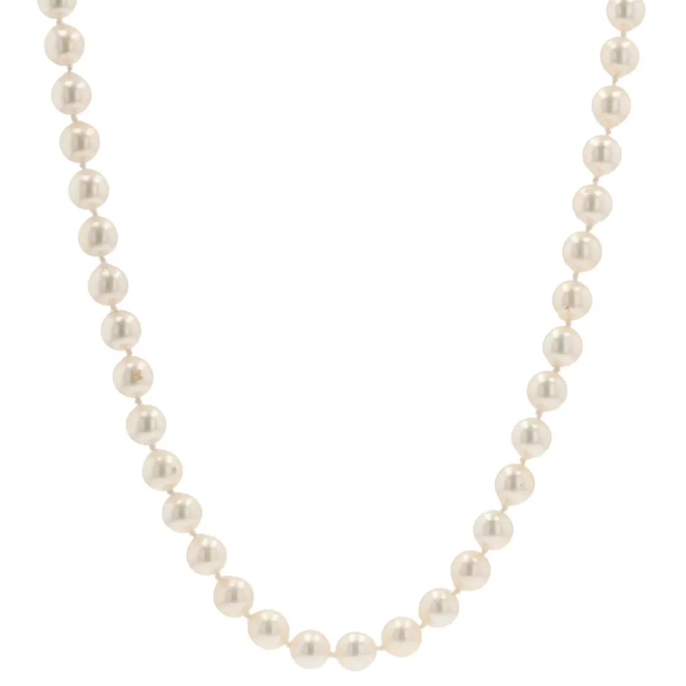 Collier de perles de culture et son fermoir diamants rubis