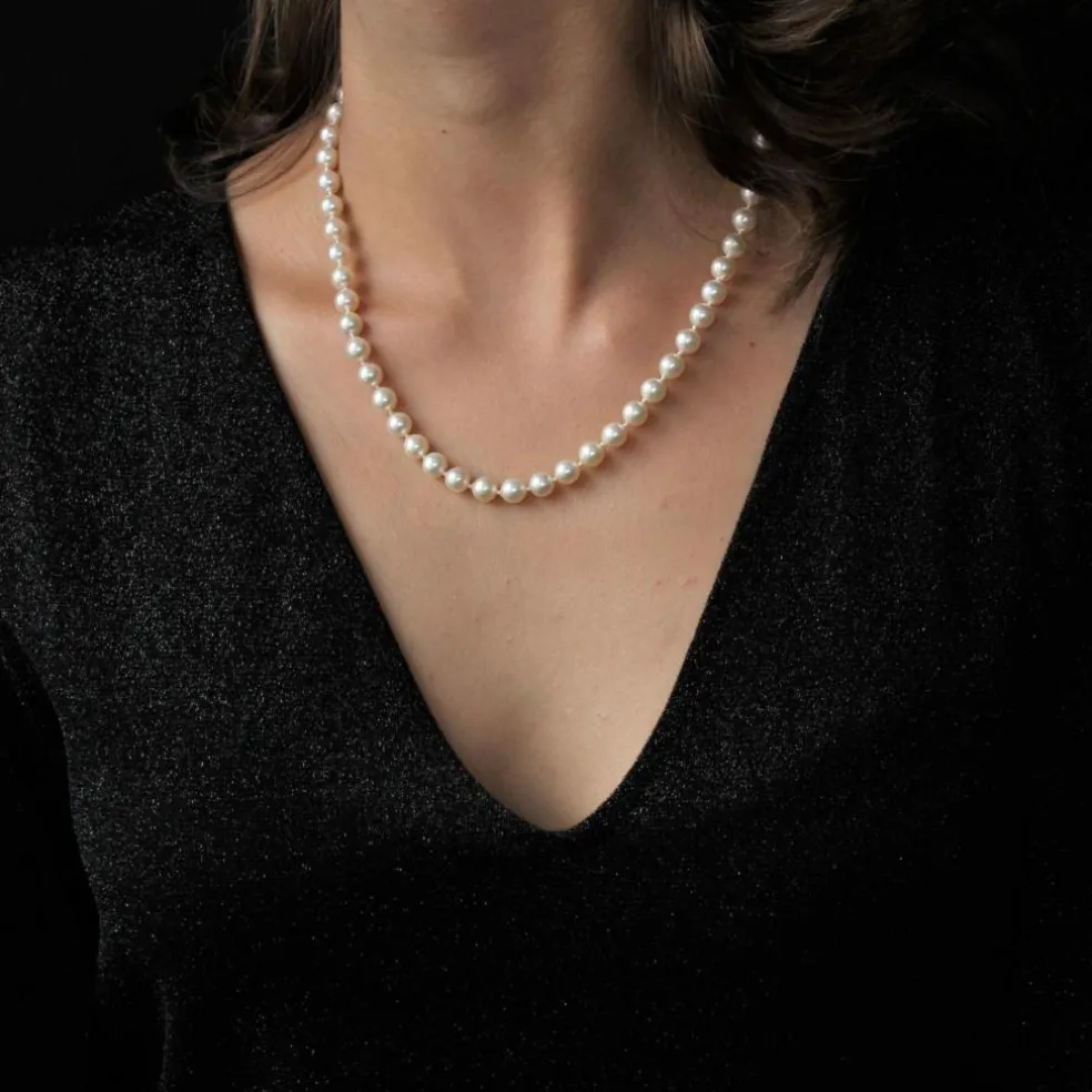 Collier de perles de culture et son fermoir diamants rubis