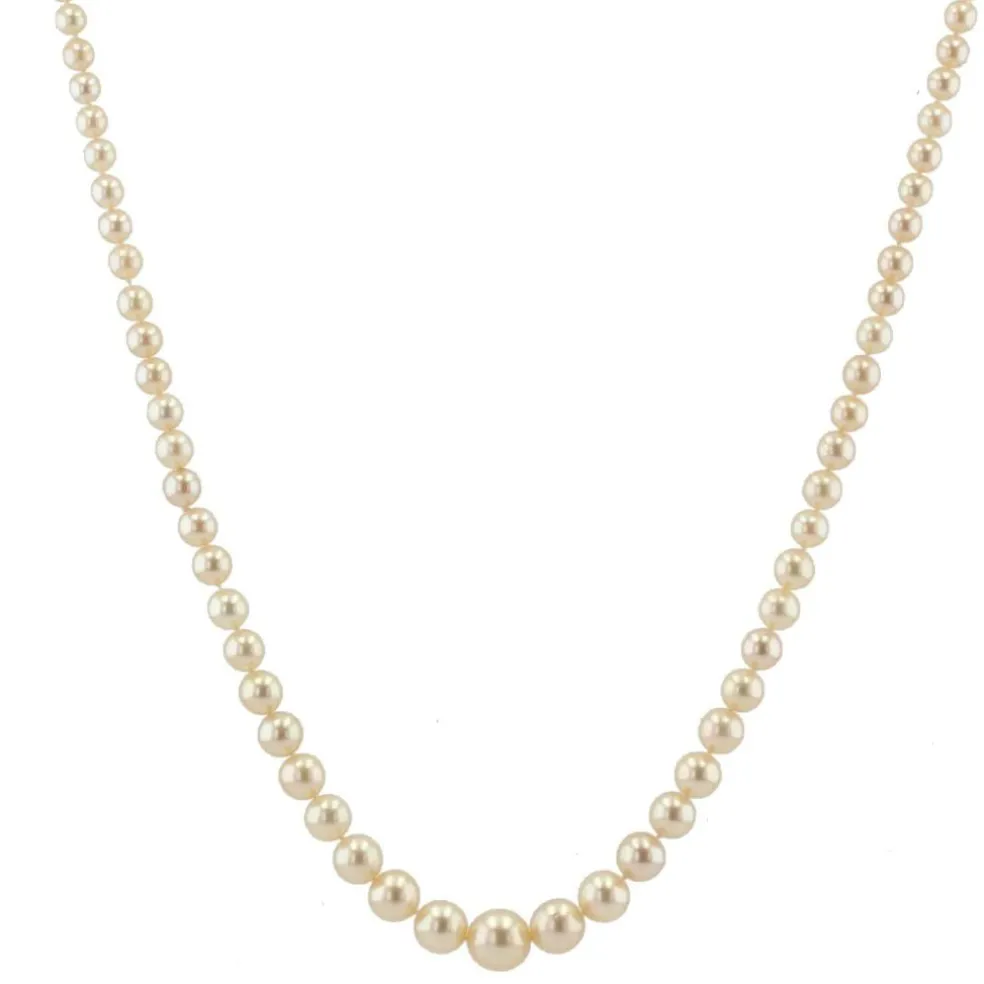 Collier de perles en chute et son fermoir diamants