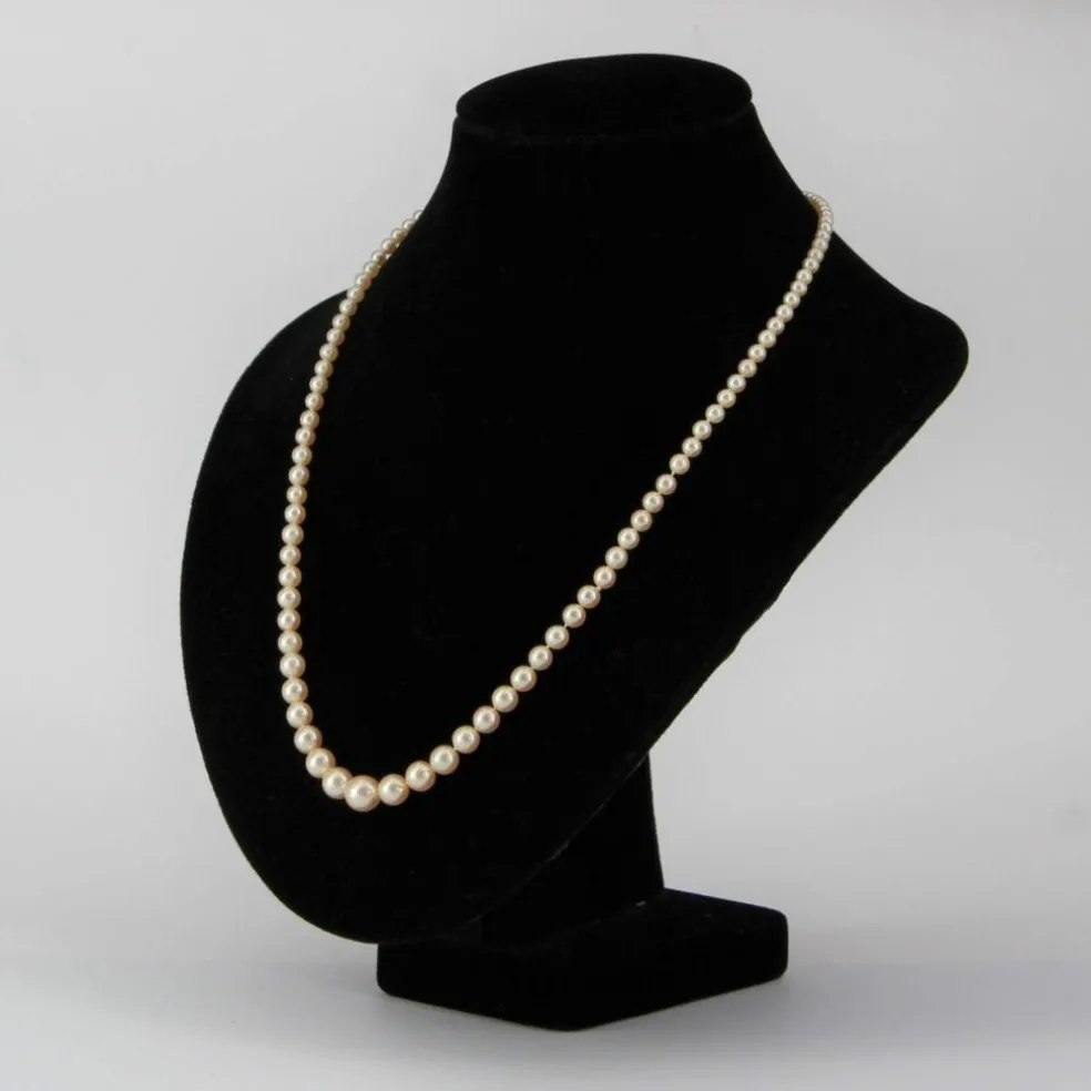 Collier de perles en chute et son fermoir diamants
