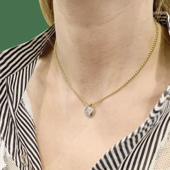 Collier deux ors, diamant.