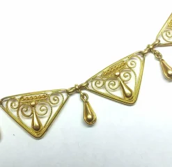 Collier draperie ancien en or jaune, fin XIXe siècle