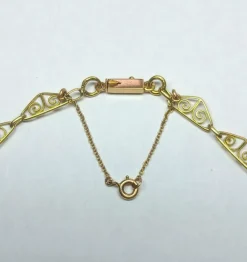 Collier draperie ancien en or jaune, fin XIXe siècle