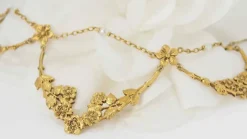 Collier draperie en or jaune et perles