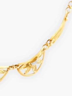 Collier draperie or et diamants