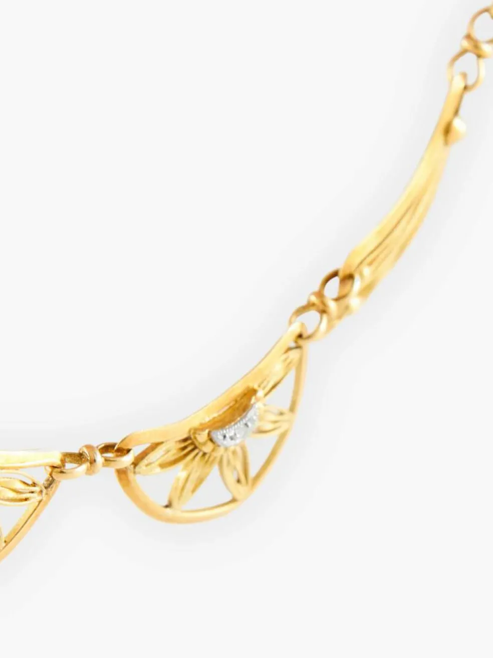 Collier draperie or et diamants