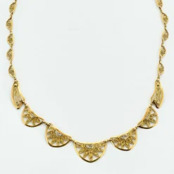 Collier draperie or et diamants