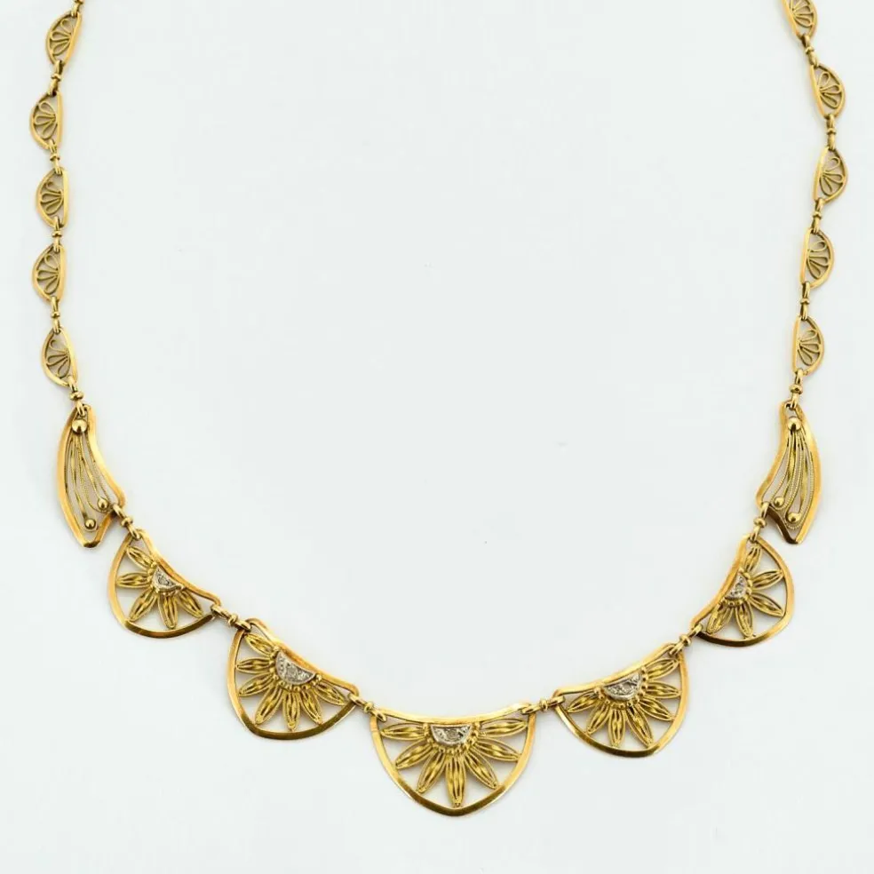 Collier draperie or et diamants