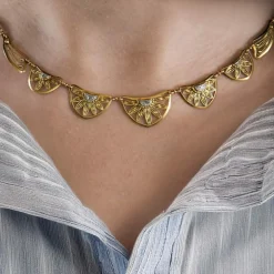 Collier draperie or et diamants