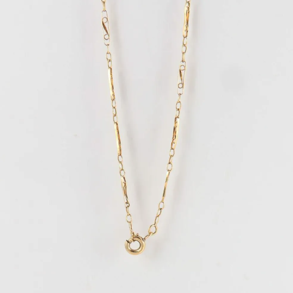 Collier draperie or jaune maille filigrane