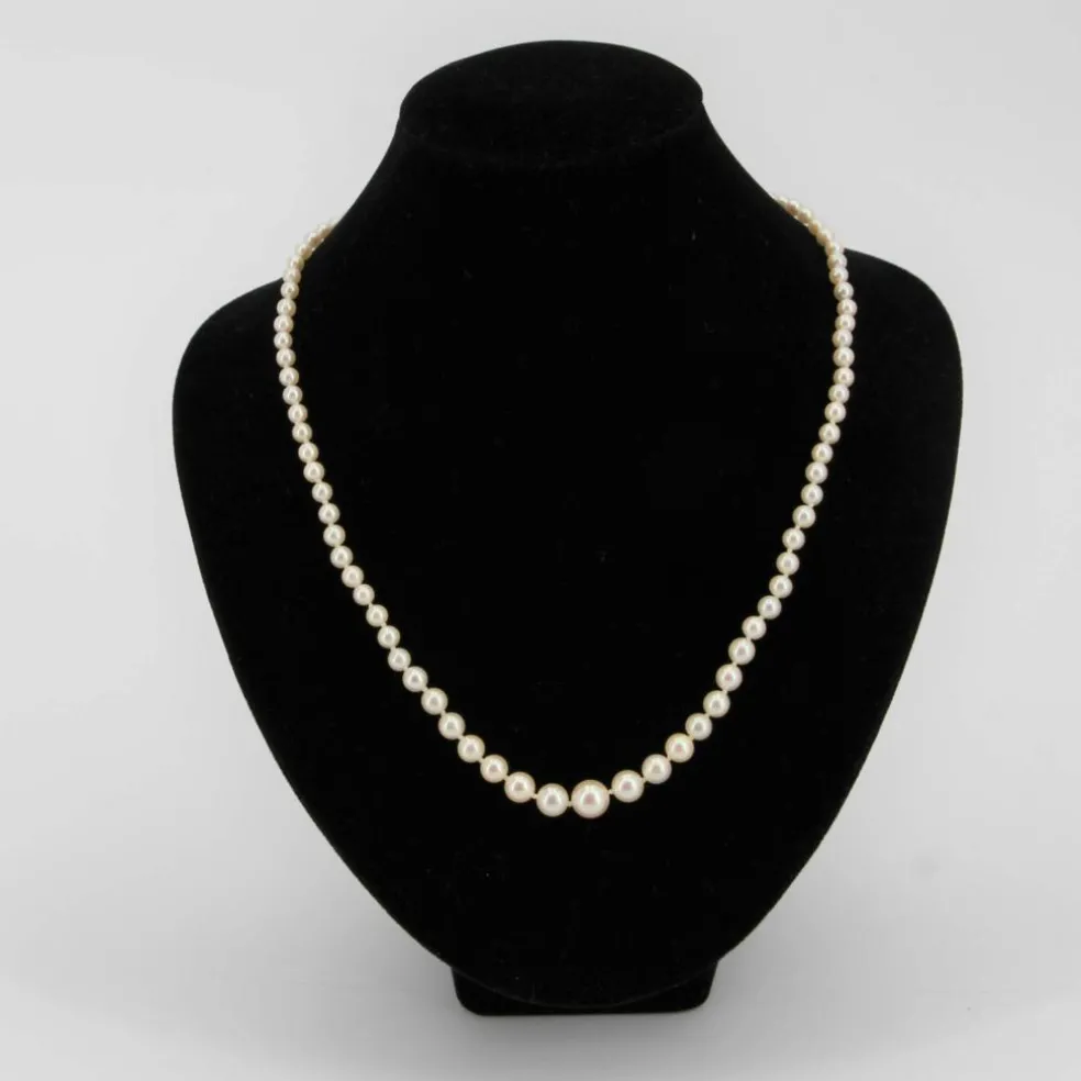 Collier en chute de perles à l'orient blanc nacré