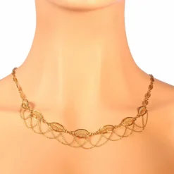 Collier en filigrane d'or, perles de graines naturelles