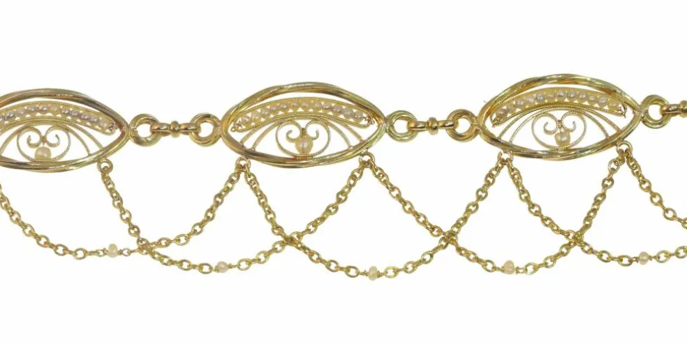 Collier en filigrane d'or, perles de graines naturelles