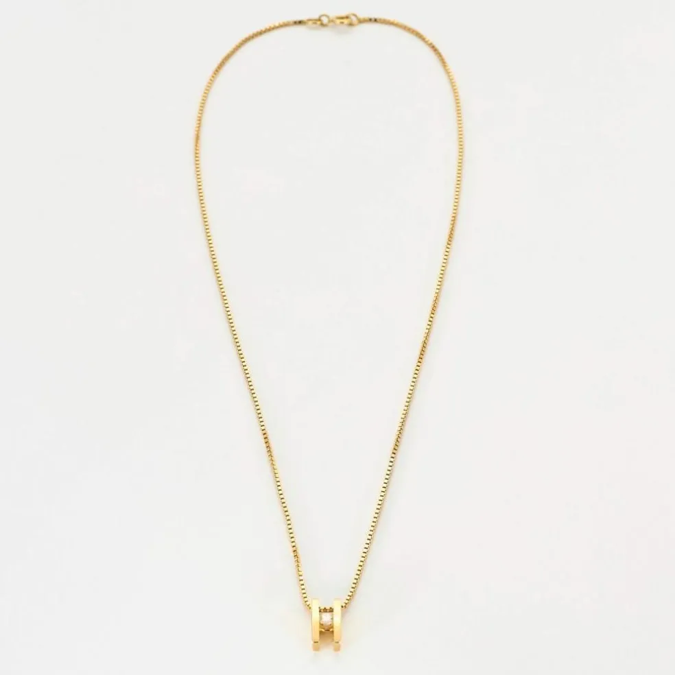 Collier en or jaune et pendentif diamant