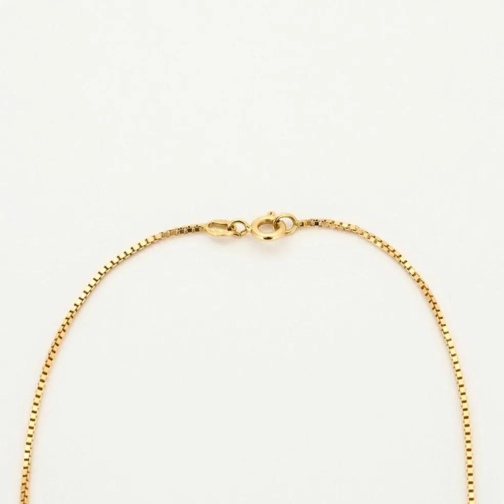 Collier en or jaune et pendentif diamant