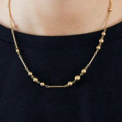 Collier en or jaune maille tressée