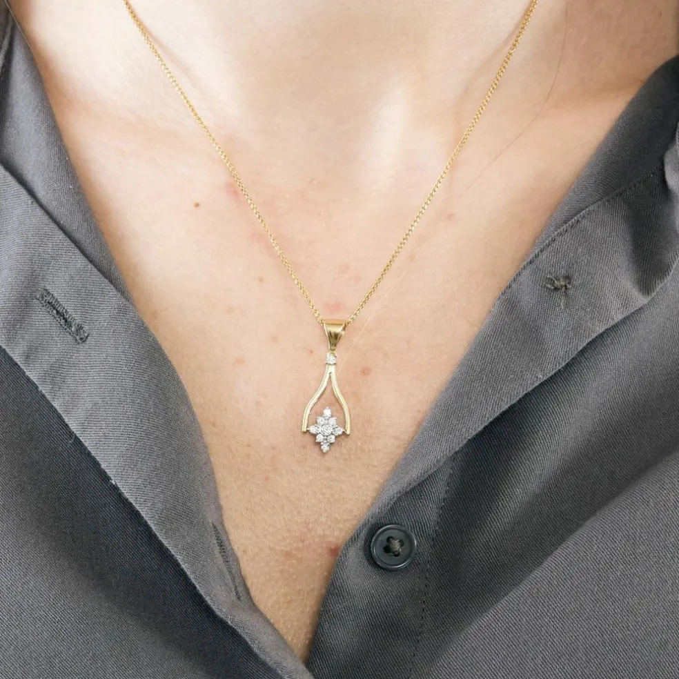 Collier en or jaune mobile avec saphirs et diamants