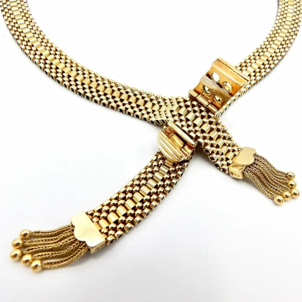 collier en or tressé avec fermoir à boucle et pompons