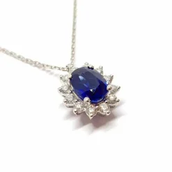 Collier entourage saphir diamants or blanc