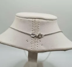 Collier et pendentif croix or blanc 18 carats sertis de diamants