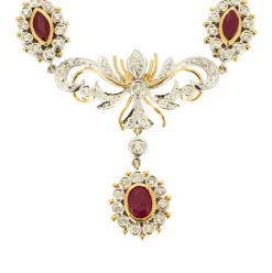Collier guirlande or jaune et or blanc, diamants et rubis
