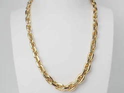 Collier maille forcat limée en chute en or jaune et diamant