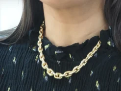 Collier maille forcat limée en chute en or jaune et diamant